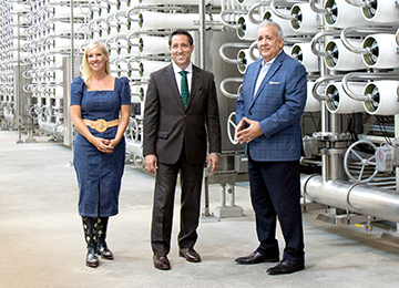 TWDB Chair Brooke Paup, Comptroller Glenn Hegar and San Antonio Water System President/CEO Robert Puente tour the H2Oaks Center.